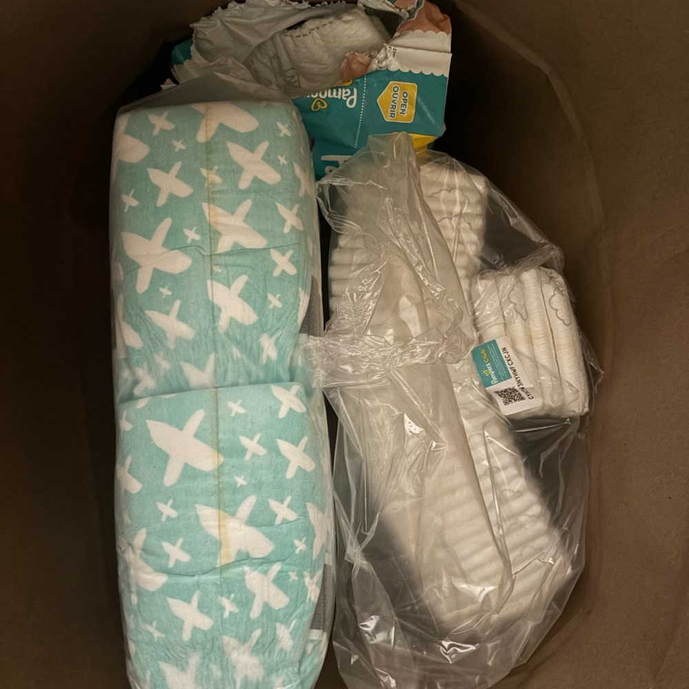 100+ Newborn (NB) Baby Diapers + I believe I found some size 1 :)
